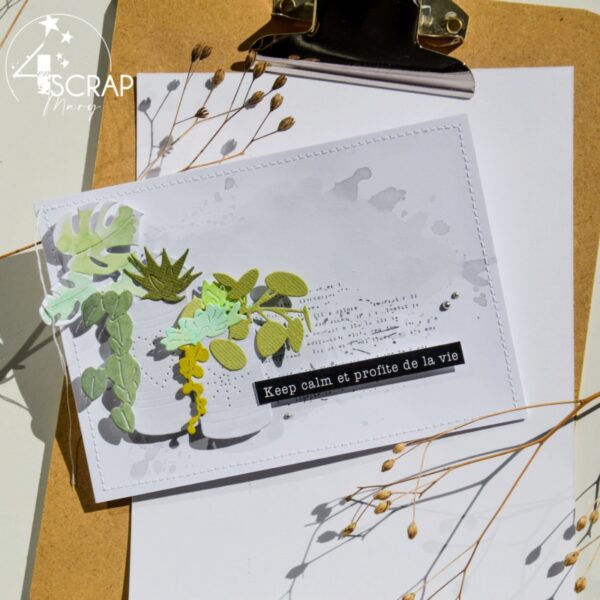 Carte de scrapbooking sur le thème du printemps avec des boites de conserves avec des plantes monstera