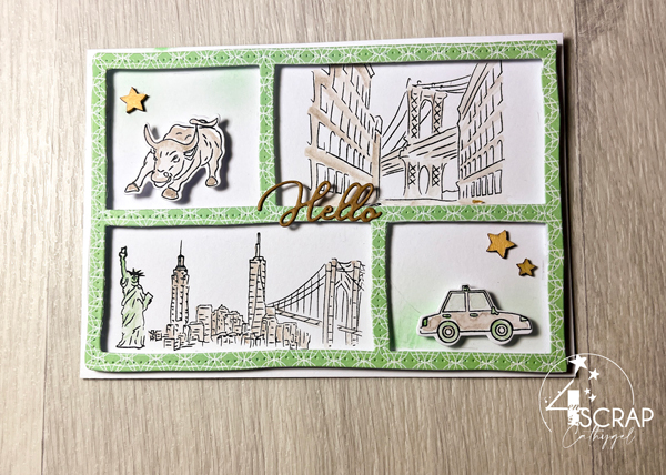 Carte de scrapbooking sur le thème du voyage à New York, avec plusieurs scènes dont la skyline de la ville, le taxi jaune...