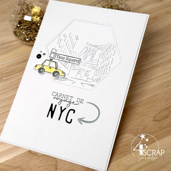 Carnet de scrapbooking sur le thème du voyage à New York, avec la skyline/le paysage de la ville avec les grand buildings.